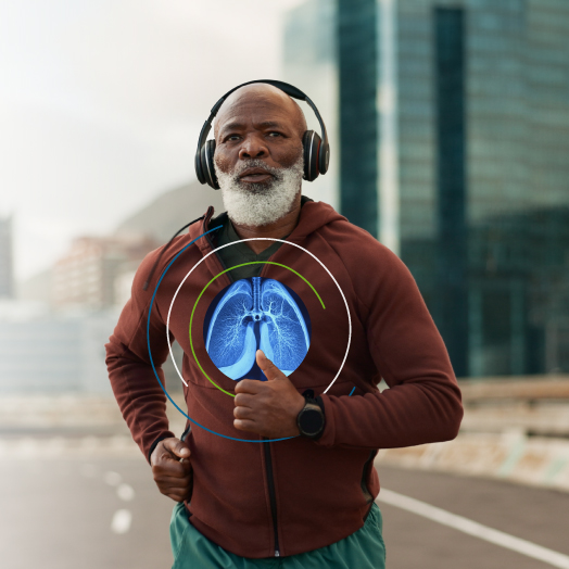 Person jogging outdoors, shown with a stylized lung scan graphic over the chest to represent lung health and low-dose CT screening