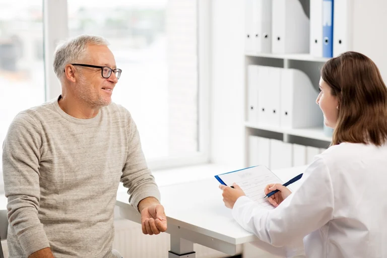 Older Man Speaking With Healthcare Provider About His Cognitive Symptoms