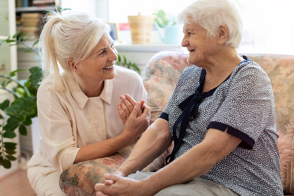 Woman Spending Time With Elderly Mother Who Has Early Signs Of Alzheimer's